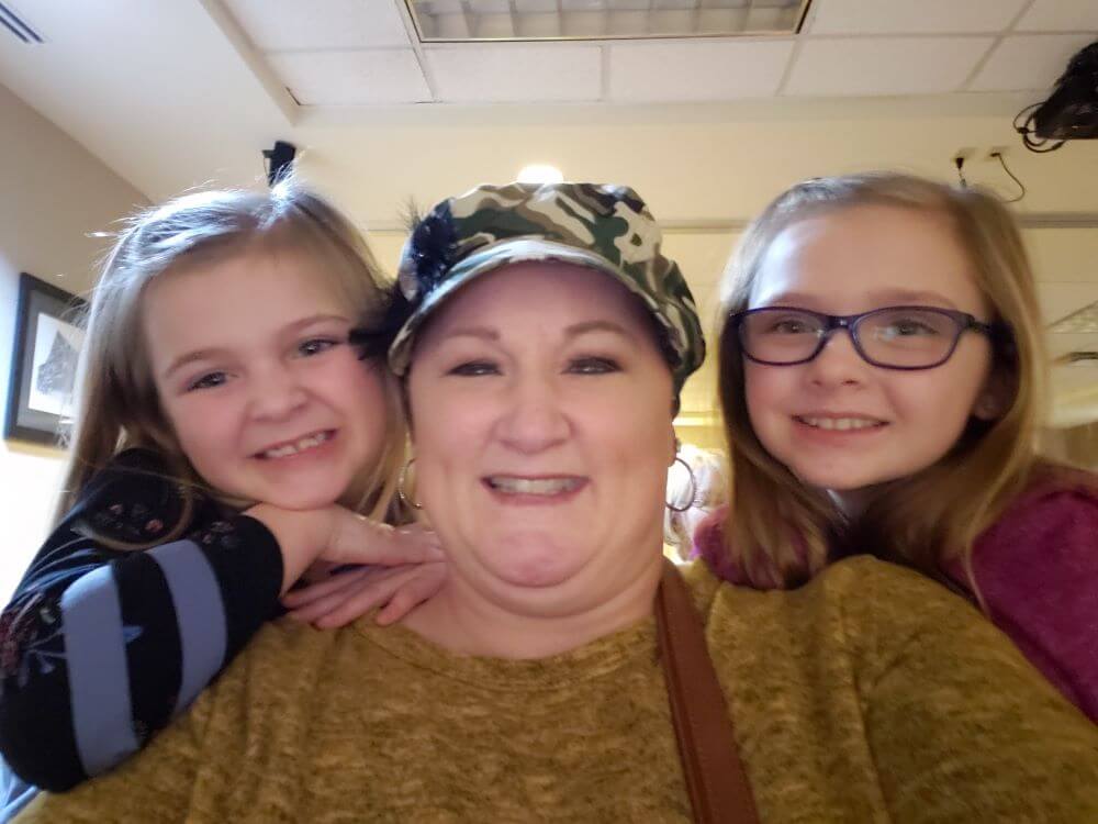 daughters with mom enjoying The Power of WOW experience 