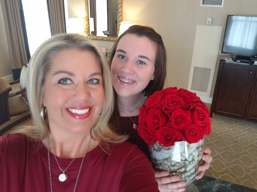 JAJF mom and daughter with roses enjoying a WOW experience 