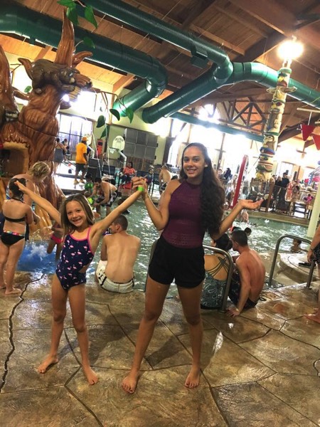 mom and daughters at Great Wolf Lodge enjoying a JAJF WOW experience 