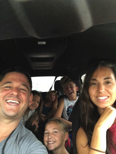 family selfie in rental car enjoying a JAJF WOW experience 