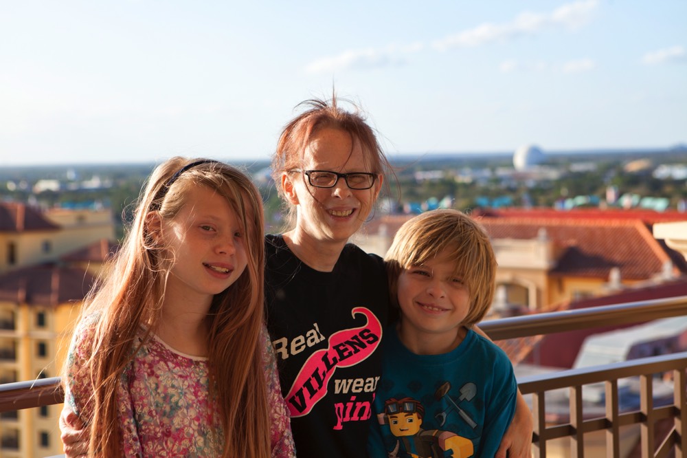 mom and children on hotel balcony enjoying JAJF WOW experience 