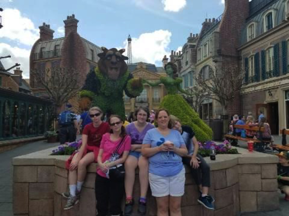 JAJF family with Beauty & The Beast  statue at Disney World 