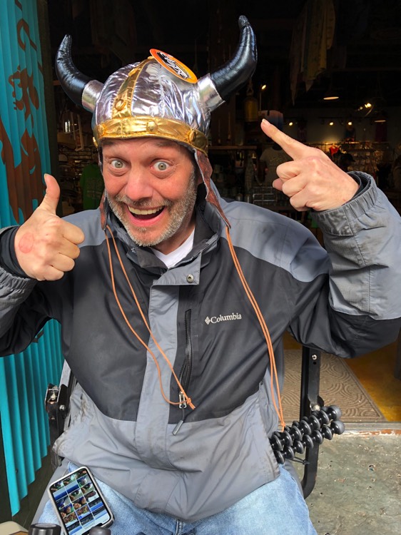 guy wearing funny hat giving thumbs up on a JAJF WOW experience 