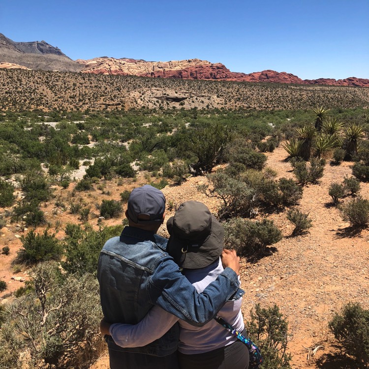 JAJF couple viewing the scenery on a hike during a late stage cancer timeout 