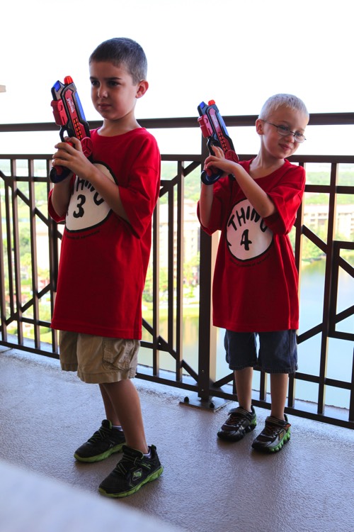 boys in Thing 3 and Thing 4 shirts on hotel balcony during a JAJF trip treating the families not the cancer 