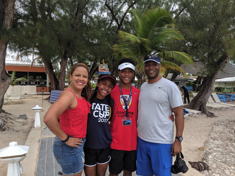 mom and dad with sons enjoying a JAJF WOW experience 