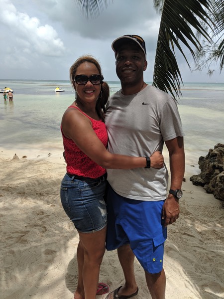 couple embracing on the beach enjoying a JAJF late stage cancer timeout 