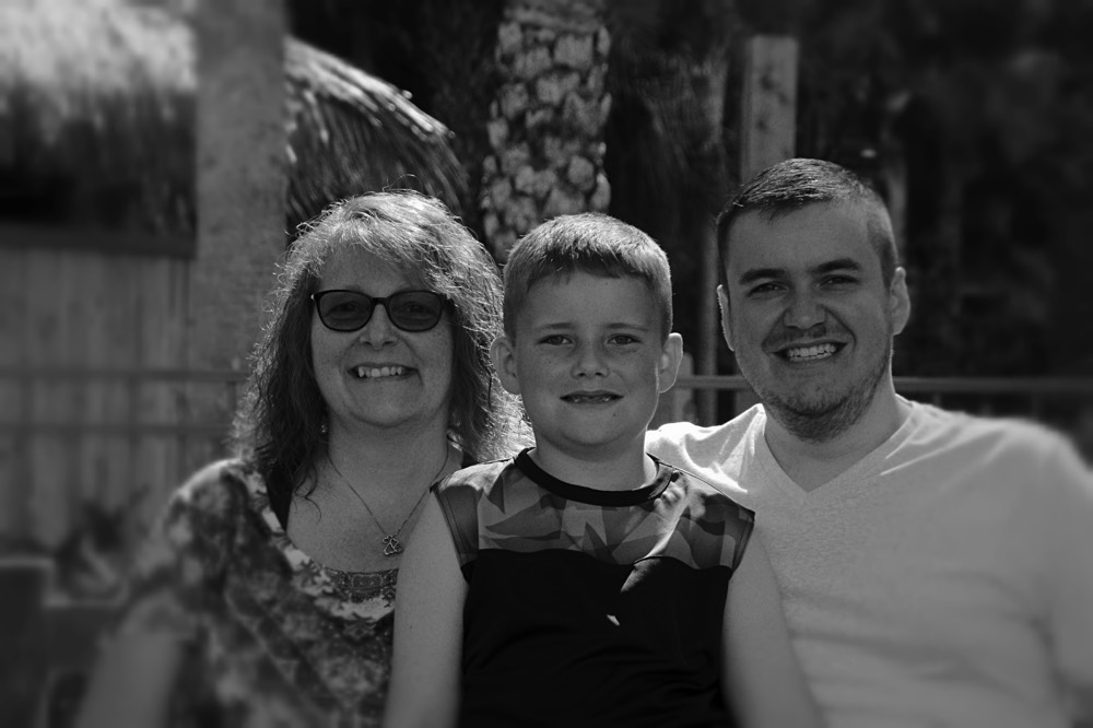 mom and dad with son on a JAJF WOW experience 