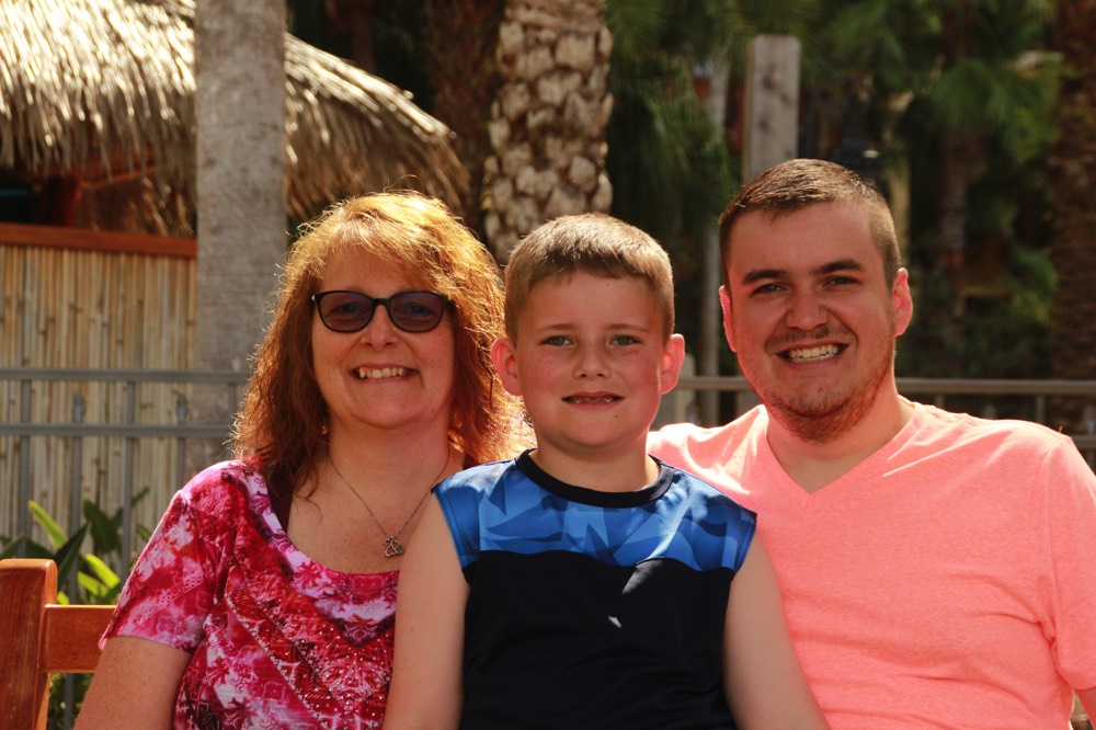 mom and dad with son on a JAJF WOW experience 