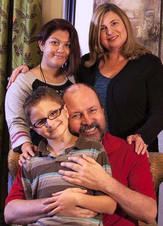 dad embracing son during a JAJF trip treating the families not the cancer 