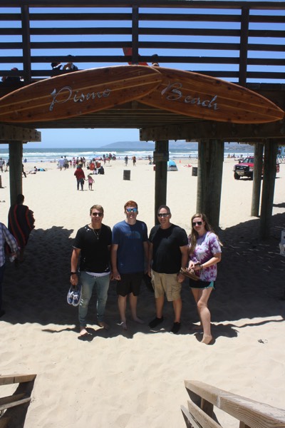 family on boardwalk overlooking the beach during a JAJF WOW experience 