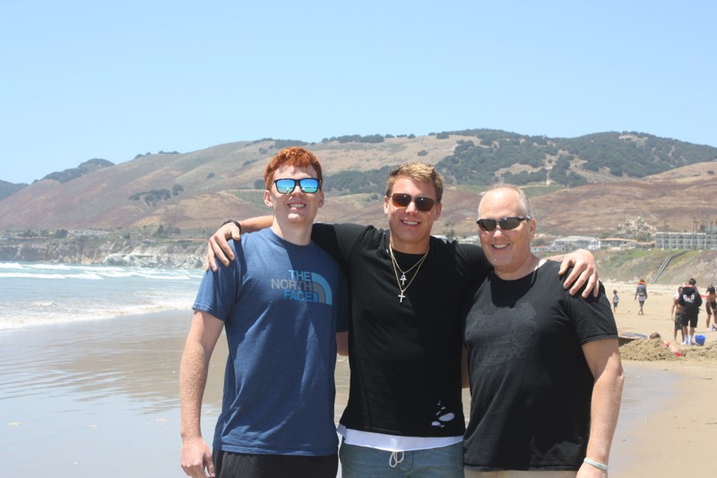 family on beach enjoying a JAJF Wow Experience 