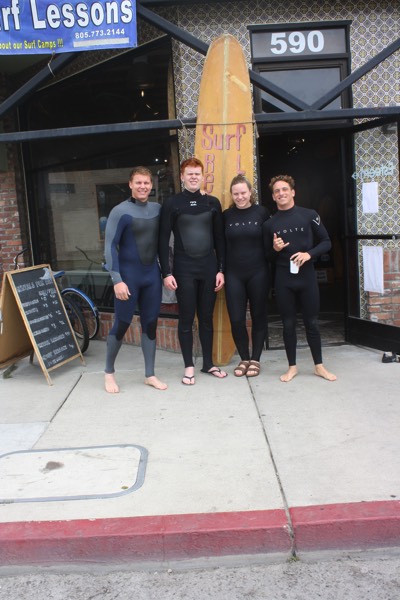 family in wetsuits after surfing enjoying a JAJF Wow Experience 