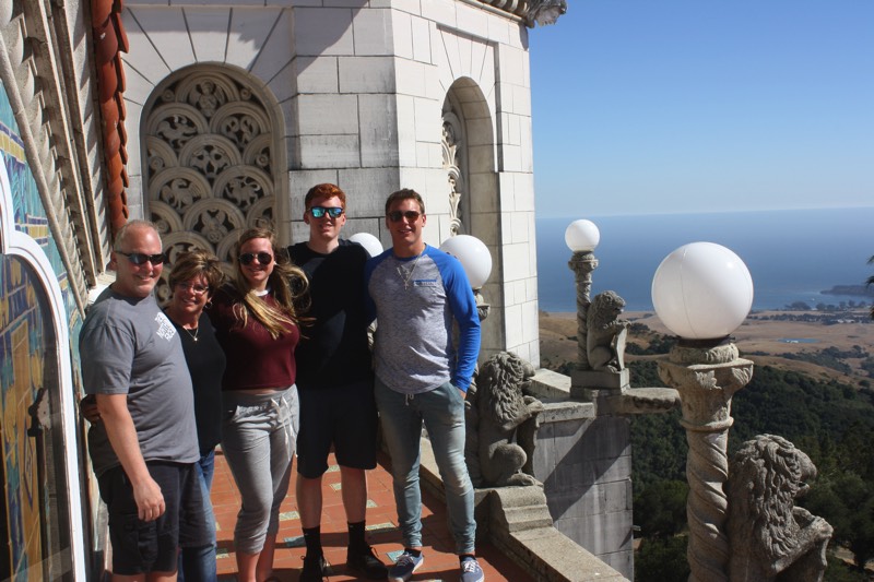 family on boardwalk overlooking the beach during a JAJF WOW experience 