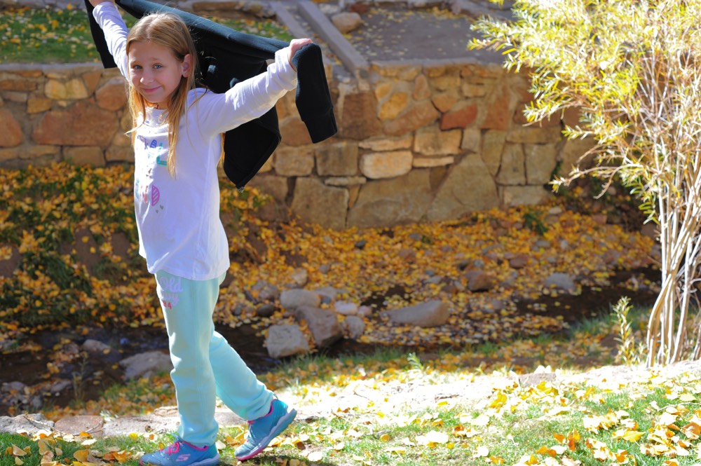 little girl holding jacket on a JAJF WOW experience 