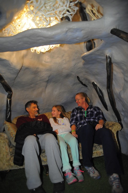 family on couch on a JAJF WOW experience 