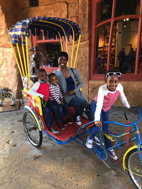 JAJF mom with children enjoying The Power of WOW at Universal Studios 