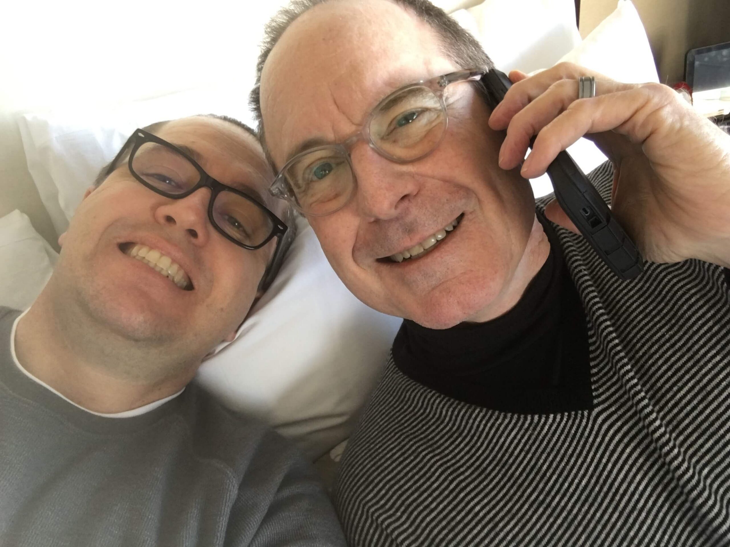 two men taking a selfie enjoying The Power of WOW experience 