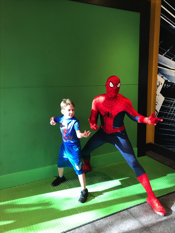 young boy with Spider Man character on a JAJF WOW experience 