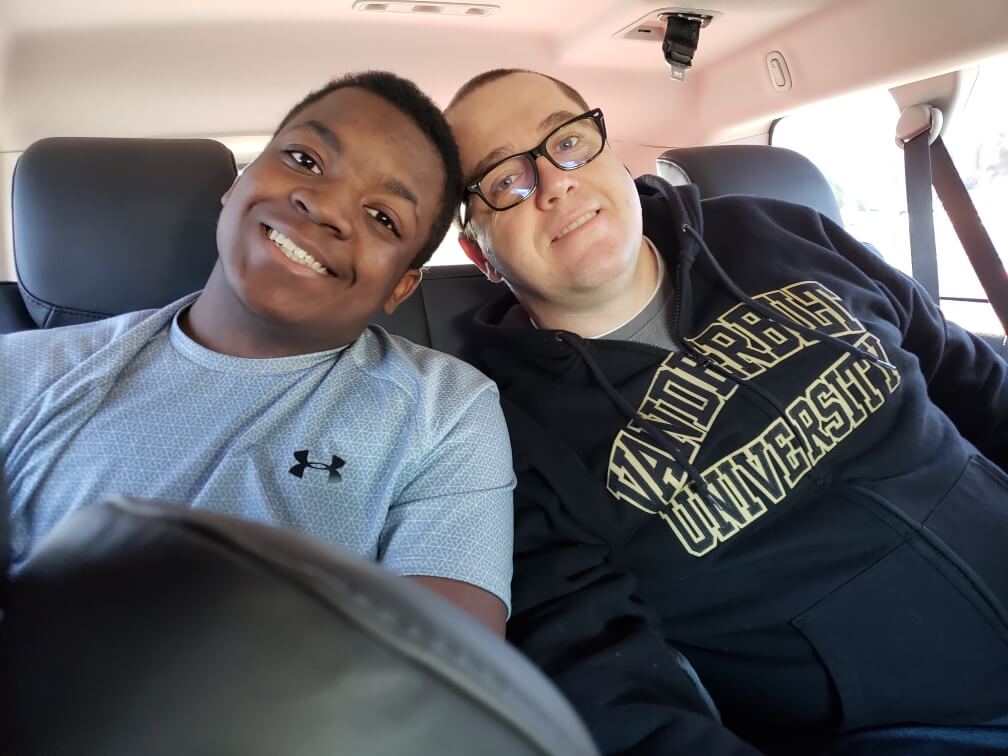 dad and son enjoying The Power of WOW experience 