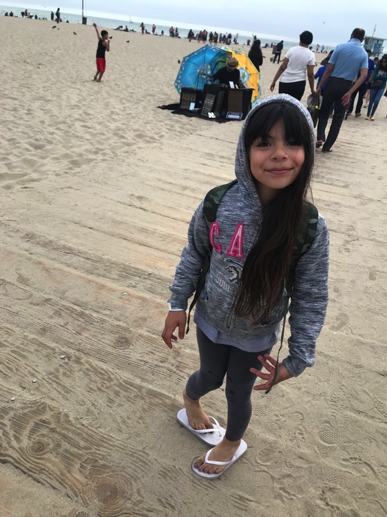 young girl in gray sweatshirt on a JAJF WOW experience 