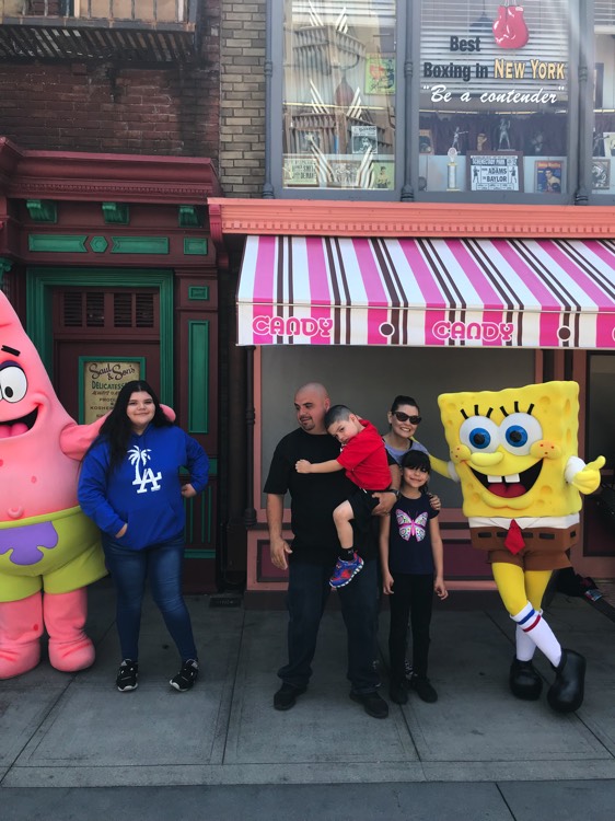 family with Sponge Bob and Patrick characters on a JAJF WOW experience 