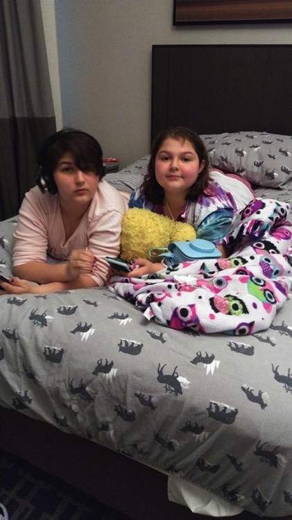 JAJF young girls on bed enjoying a break from late stage cancer 
