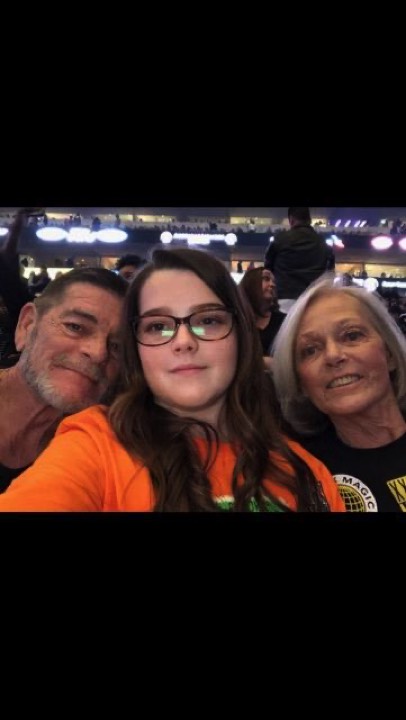 family taking a selfie enjoying The Power of WOW experience 