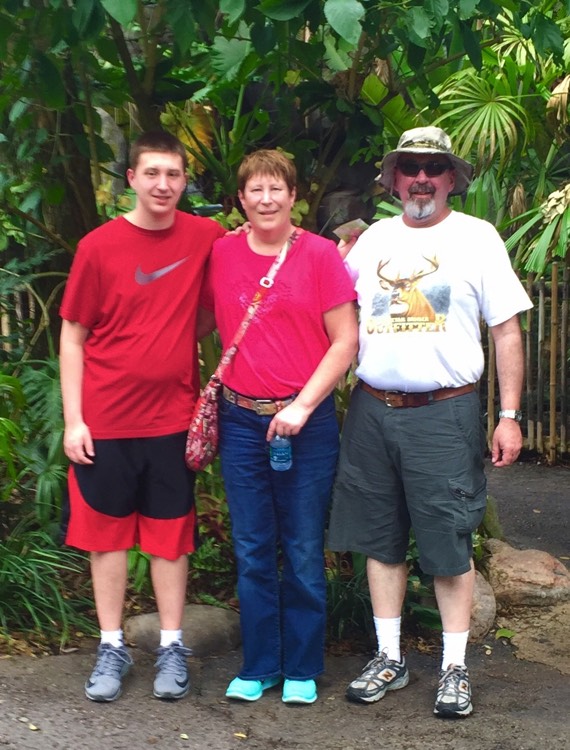 couple with teenage son at Universal Studios enjoying a JAJF WOW experience 
