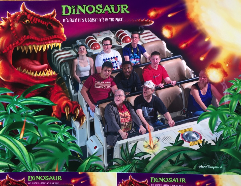 people on Jurassic Park ride at Universal Studios enjoying a JAJF trip treating the families not the cancer 