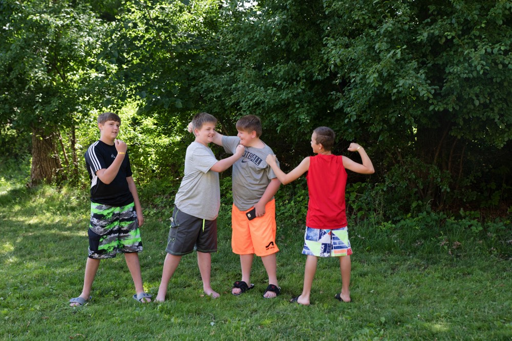 group of boys in bathing suits playing enjoying a JAJF WOW experience 
