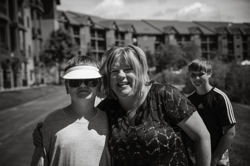 mom and teenage son wearing a visor enjoying a JAJF WOW experience 