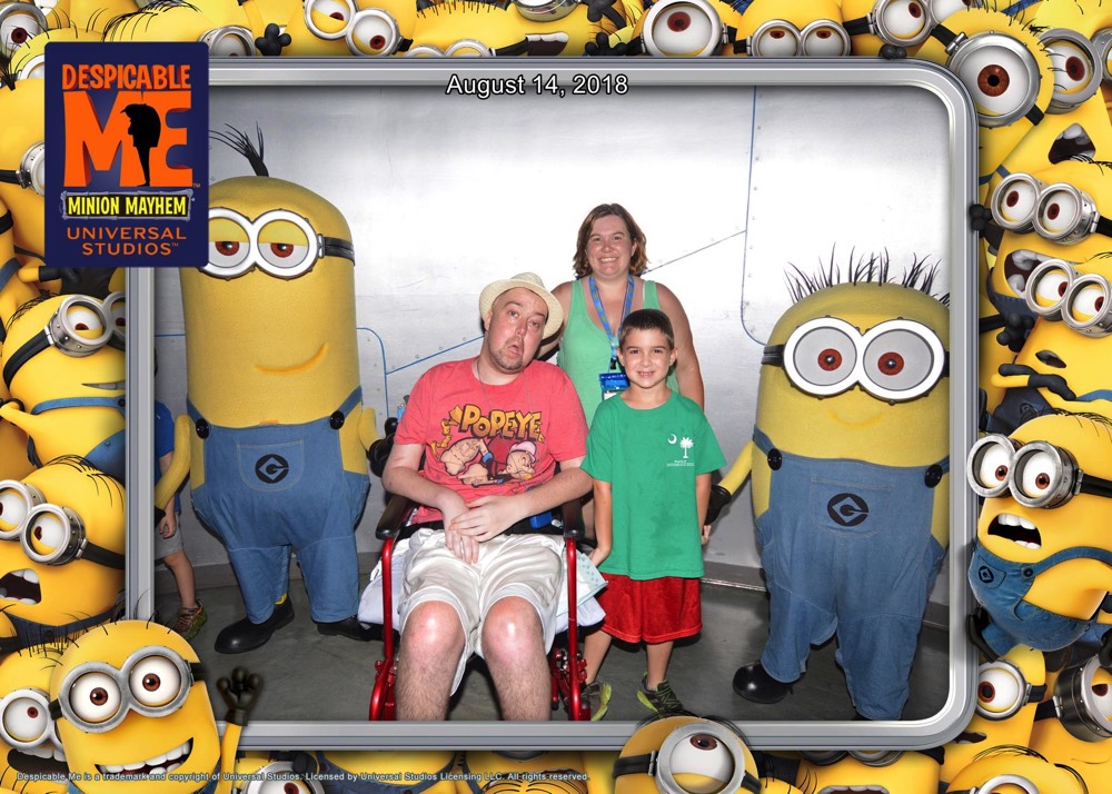 family posing with minion characters during a JAJF trip treating the families not the cancer 